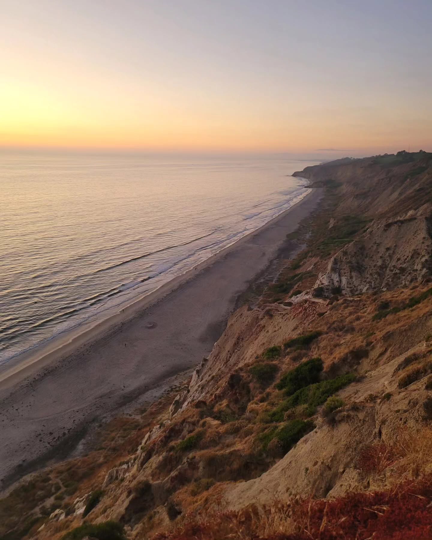 Pacific Ocean and coastal cliffs near San Diego at sunset
